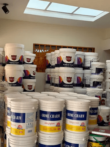 Home Charm emulsion and Shield acrylic paint buckets in warehouse